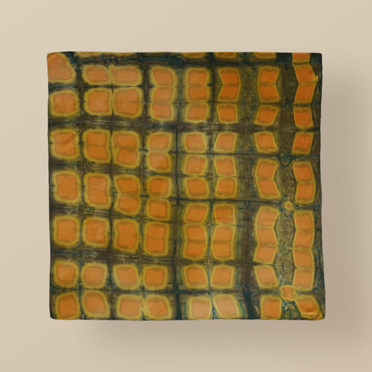 Scarf — Amber Green styled and worn, showing the natural plant-dyed pattern