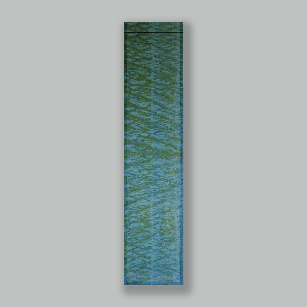 alternate angle of Motif Linen Noren — Wave hanging as a two-panel doorway curtain