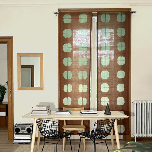 alternate angle of Motif Linen Noren — Amber Grid hanging as a two-panel doorway curtain
