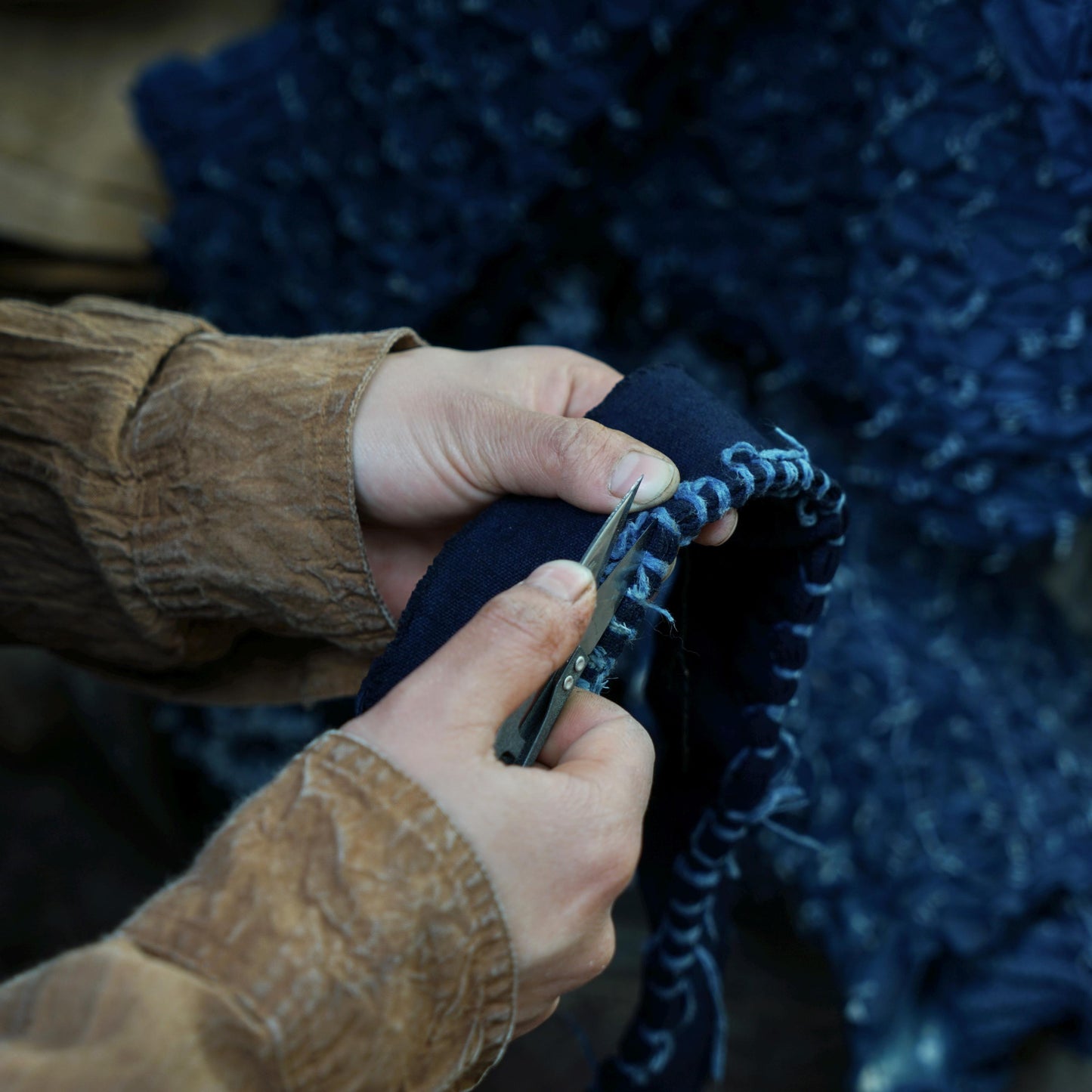 Scarf — Clay Green styled and worn, showing the natural plant-dyed pattern