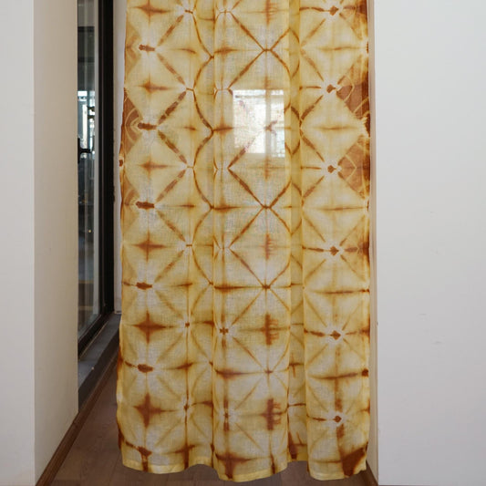Linen Panel — Oat Dots hanging by a window, filtering daylight in a styled interior