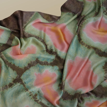 flat-lay view of Scarf — Clay Green highlighting the natural dye and motif
