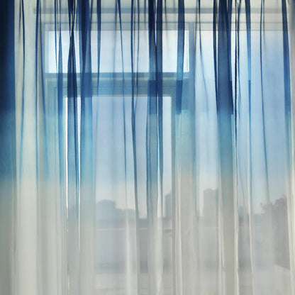 Sheer Curtain — Indigo Flow shown in a bedroom or living room setting