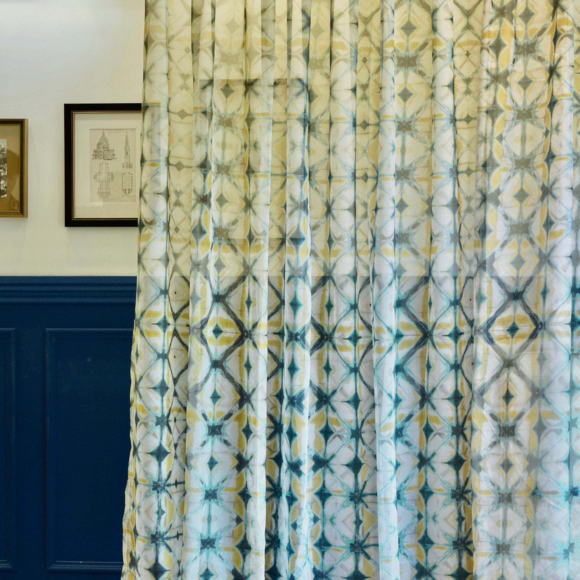 detail view of Pattern Drapery — Moss Yellow showing plant-dyed pattern and sheer drape