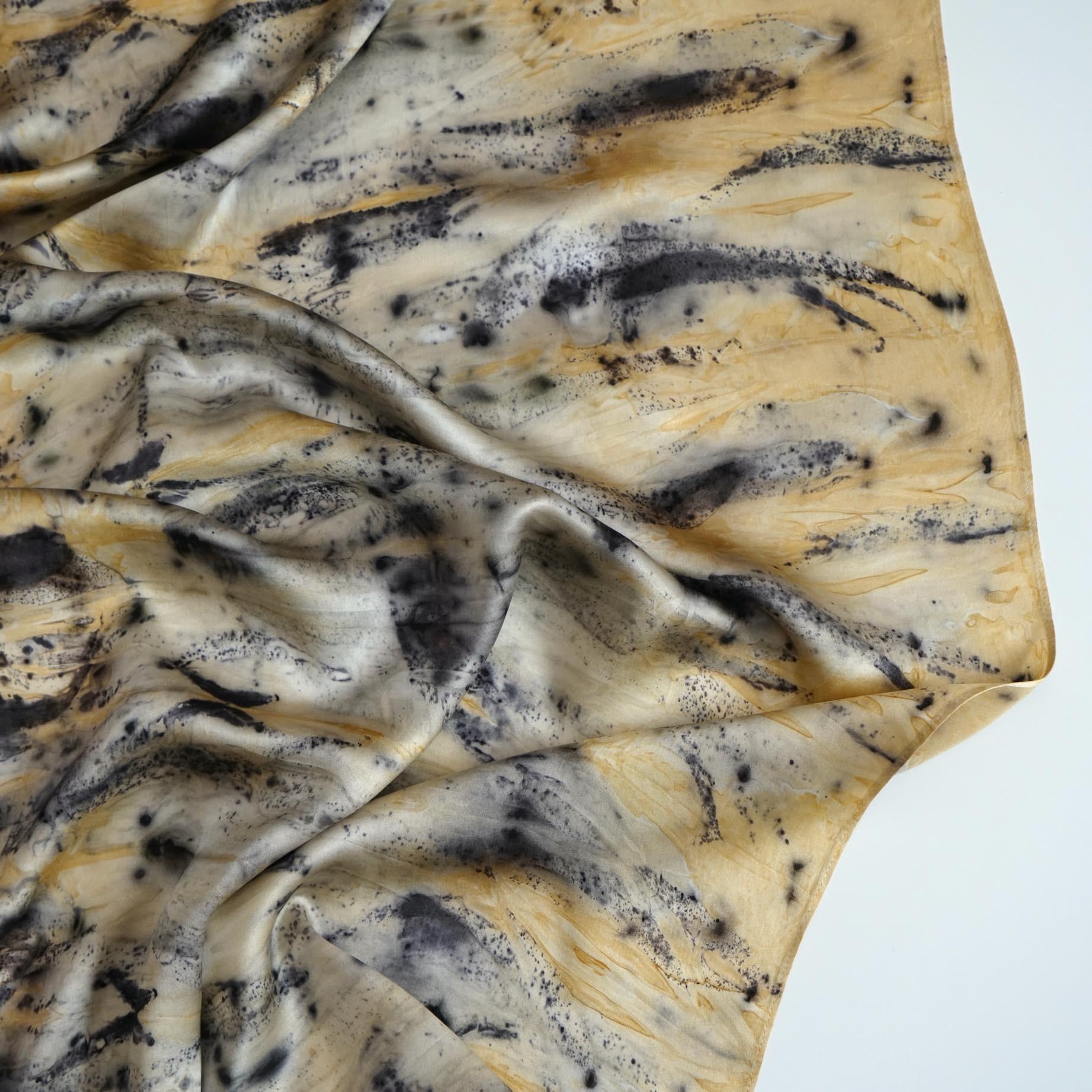 Scarf — Ochre Vine styled and worn, showing the natural plant-dyed pattern