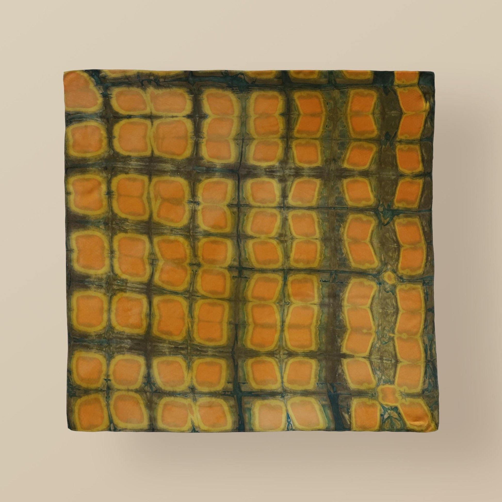 Scarf — Amber Green styled and worn, showing the natural plant-dyed pattern