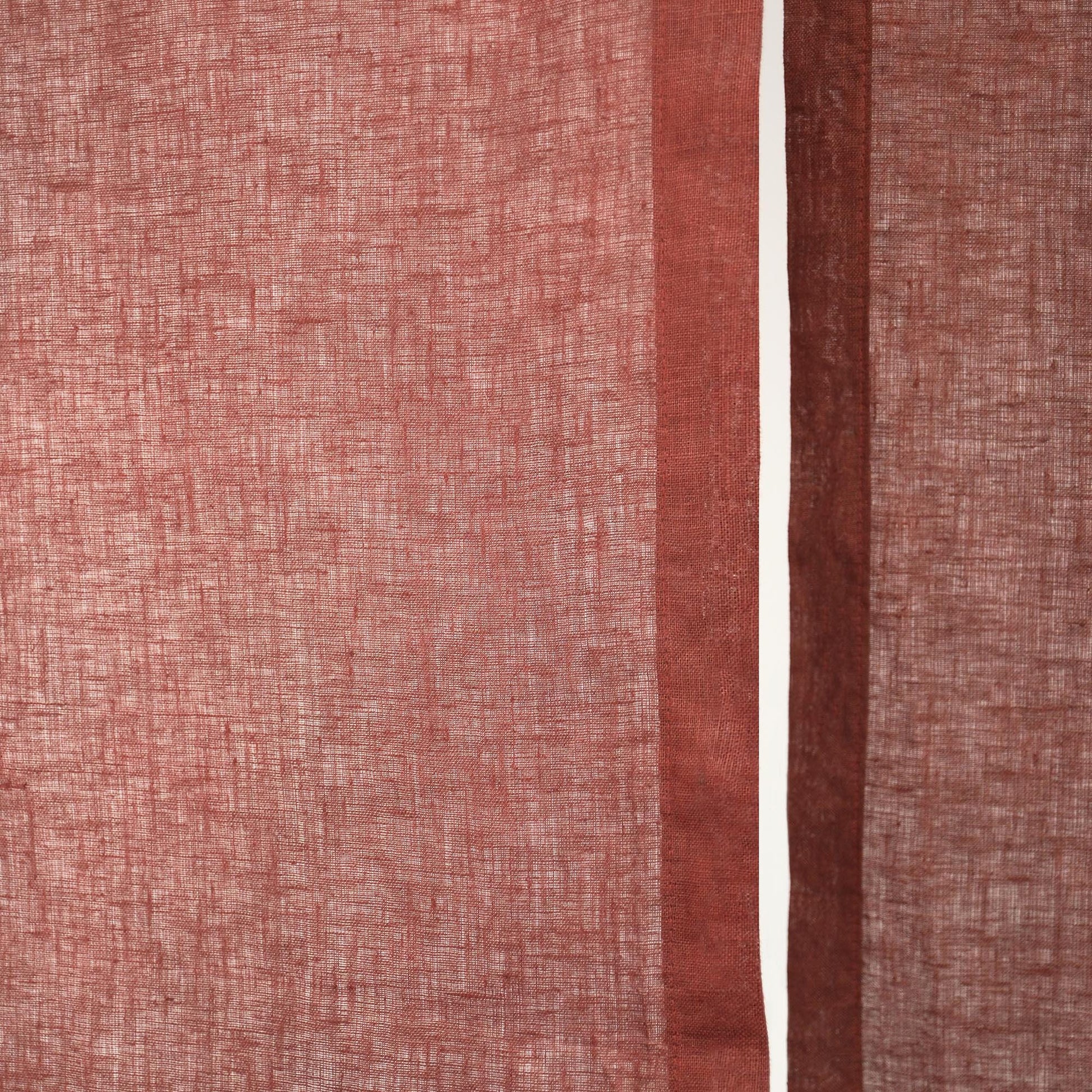 alternate angle of Soft Tone Noren — Dusty Rose hanging as a two-panel doorway curtain