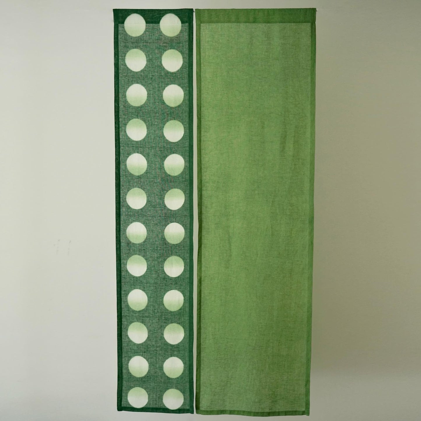 styled room scene with Polka Dot Linen Noren — Sage / Green used as a window or doorway curtain