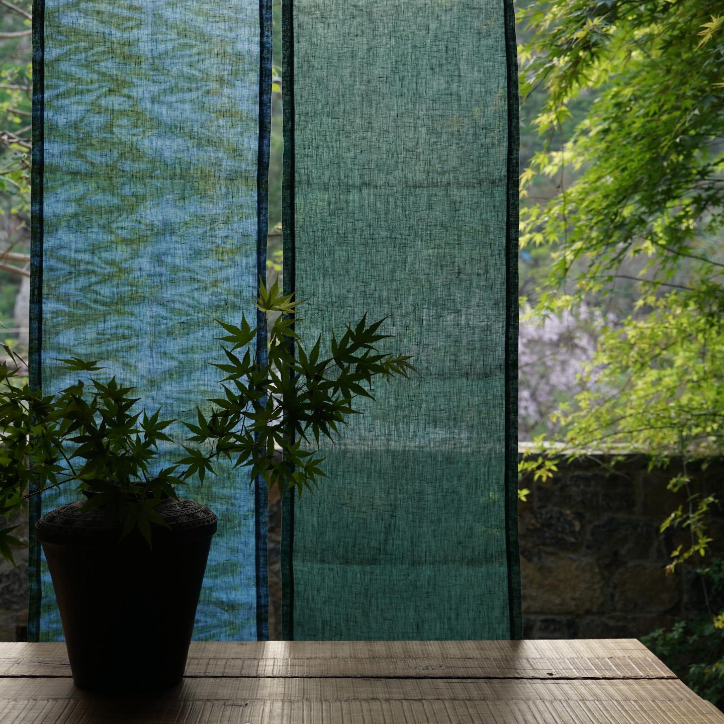 detail view of Motif Linen Noren — Wave showing plant-dyed linen texture and pattern