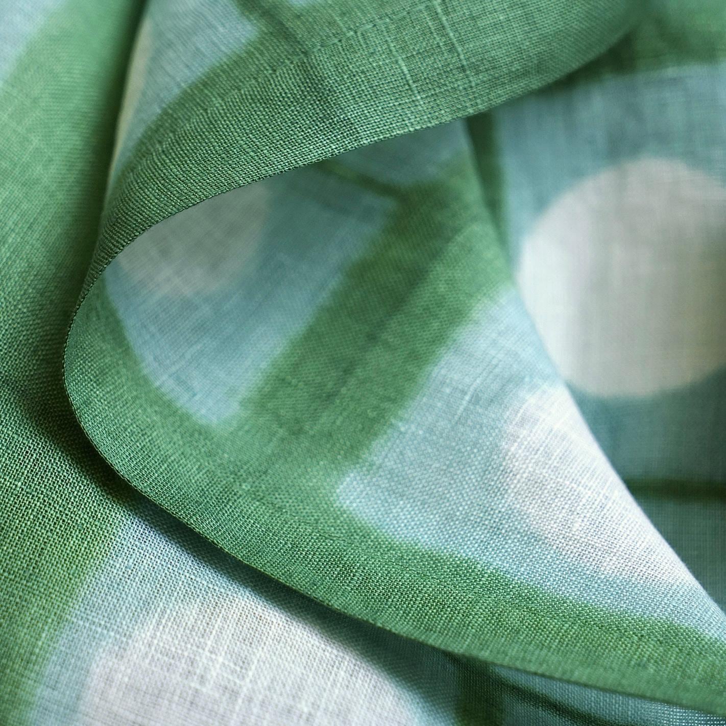 detail view of Motif Linen Noren — Soft Moss showing plant-dyed linen texture and pattern