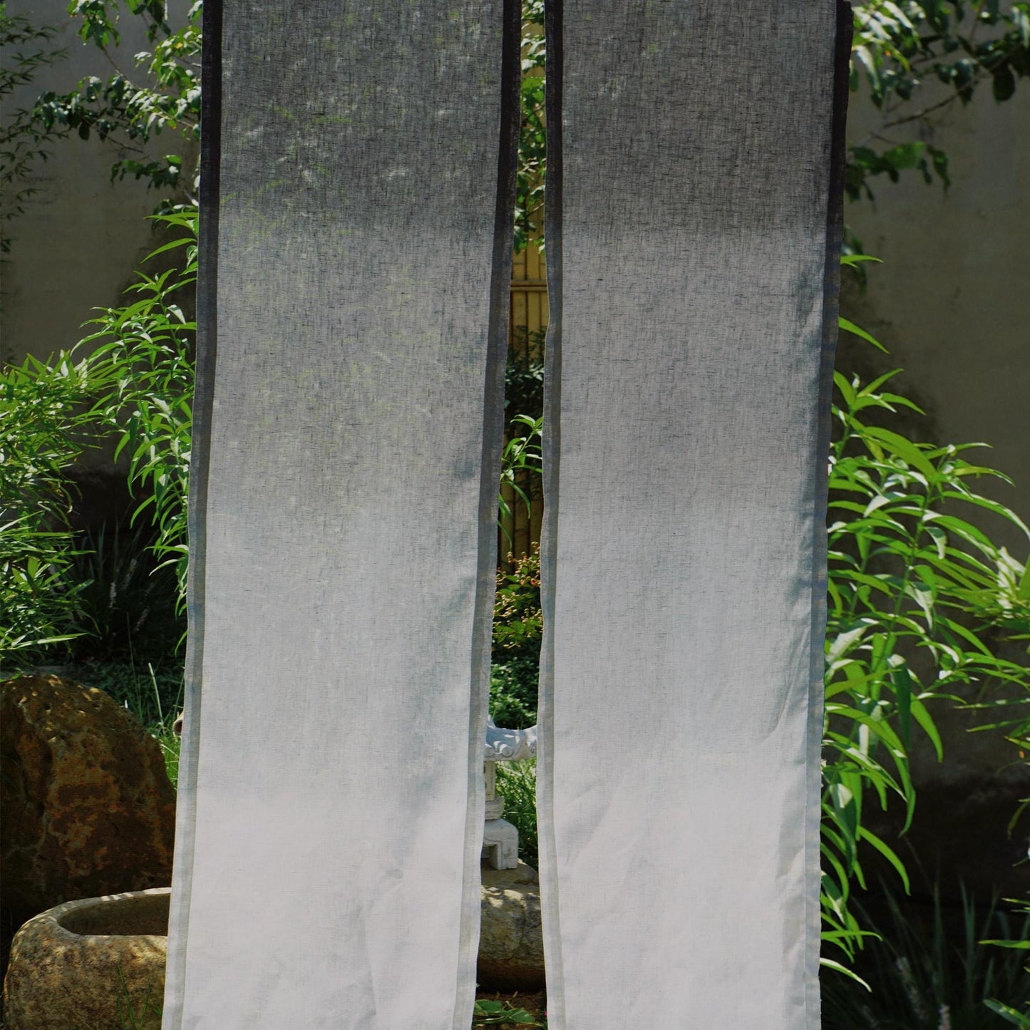 detail view of Soft Tone Noren — Ink Grey showing plant-dyed linen texture and pattern