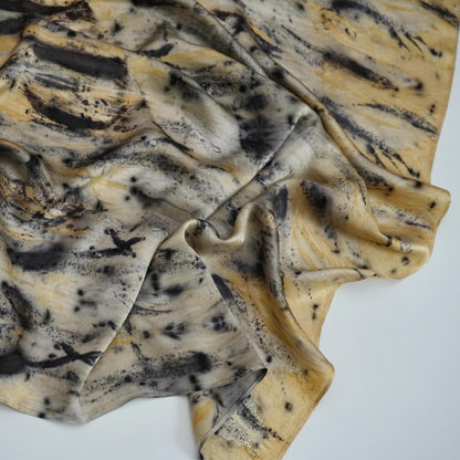 close-up of Scarf — Ochre Vine showing the soft weave and botanical color