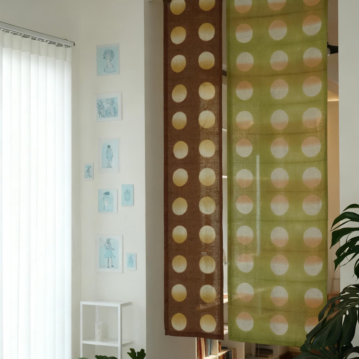 alternate angle of Polka Dot Linen Noren — Orange / Yellow hanging as a two-panel doorway curtain