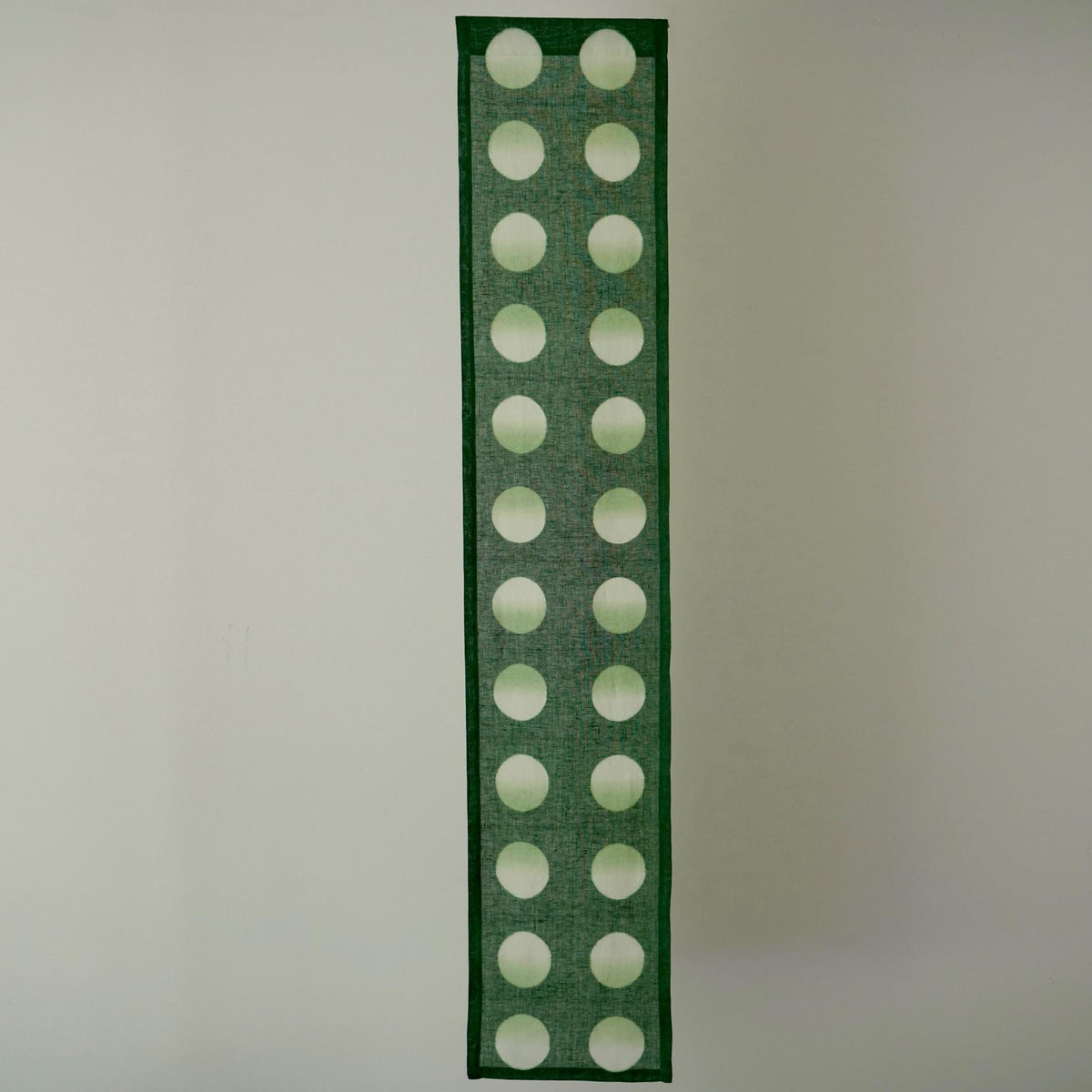 detail view of Polka Dot Linen Noren — Sage / Green showing plant-dyed linen texture and pattern