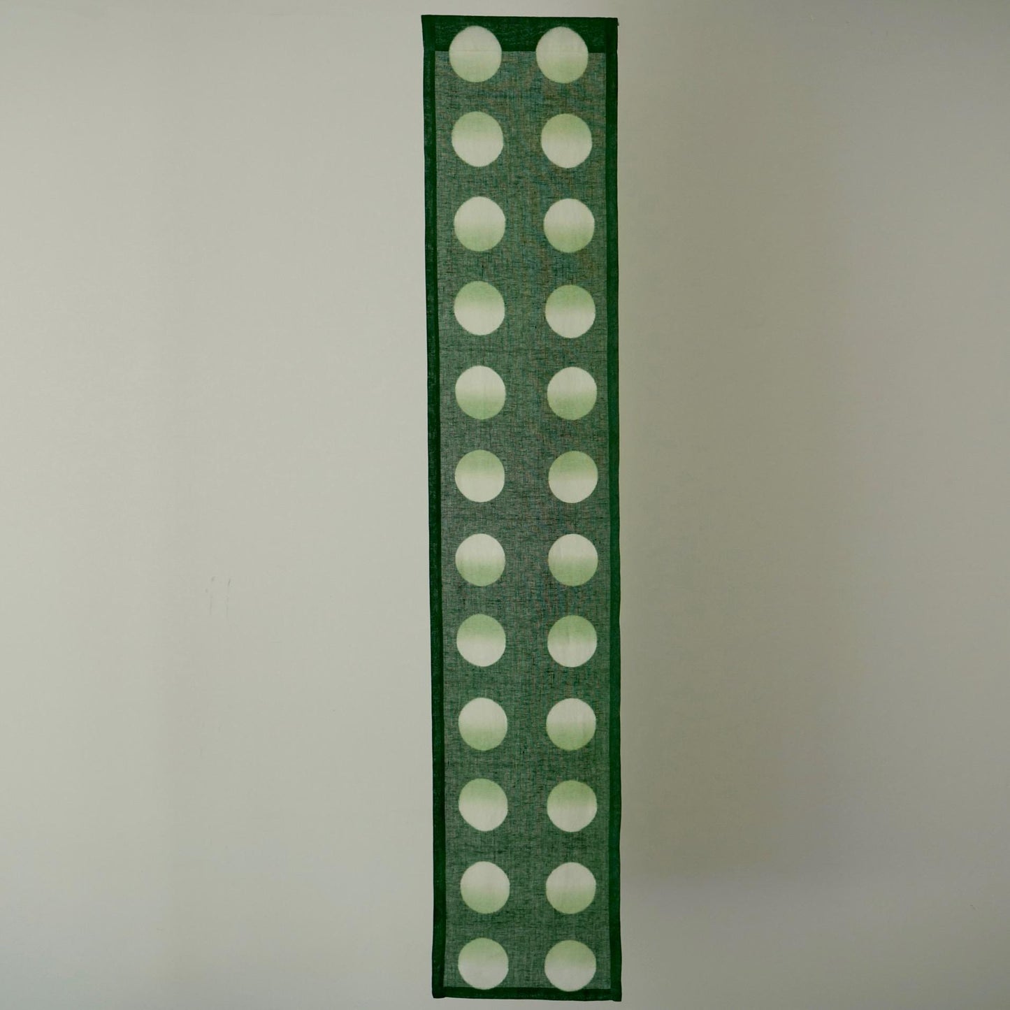 detail view of Polka Dot Linen Noren — Sage / Green showing plant-dyed linen texture and pattern