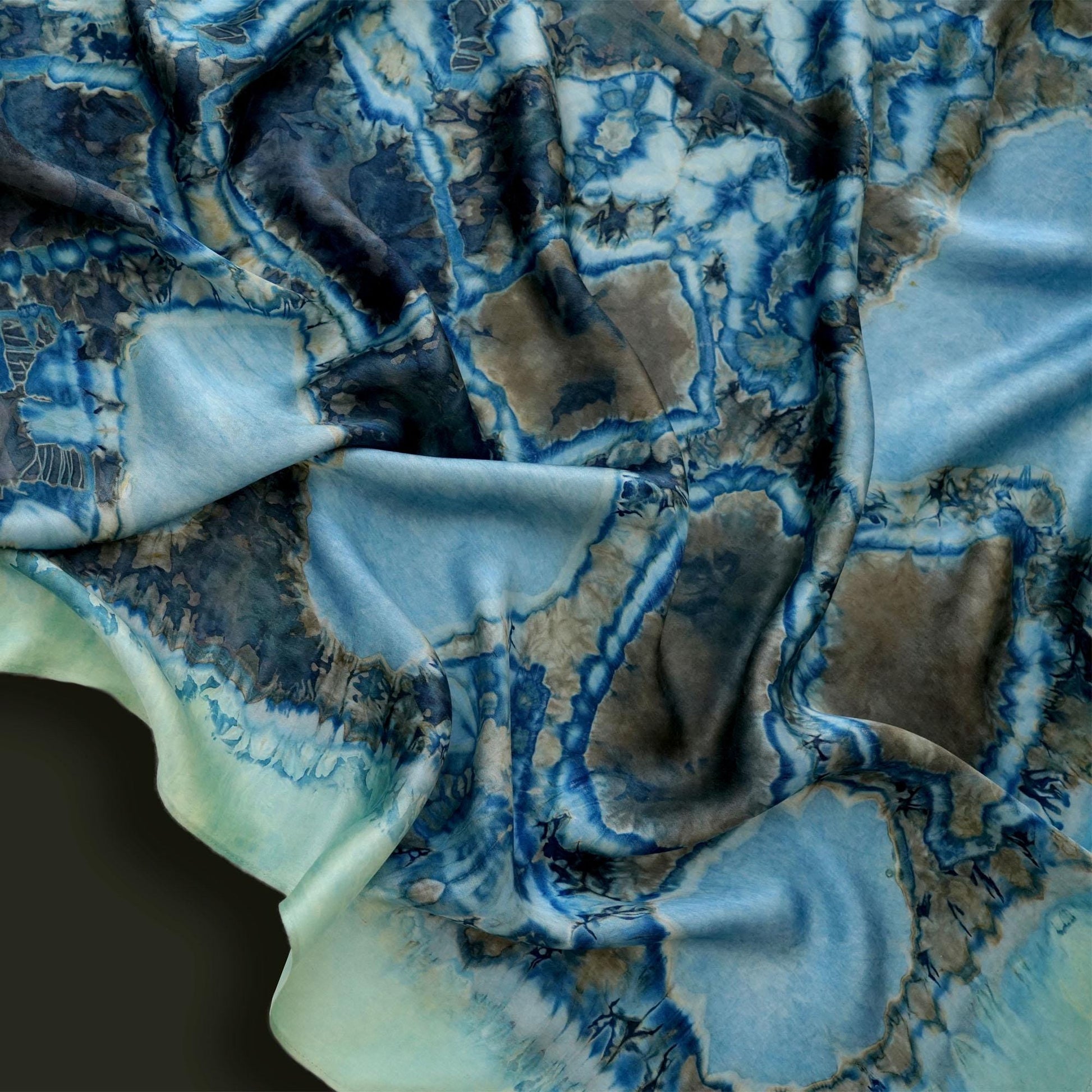 close-up of Scarf — Deep Teal showing the soft weave and botanical color