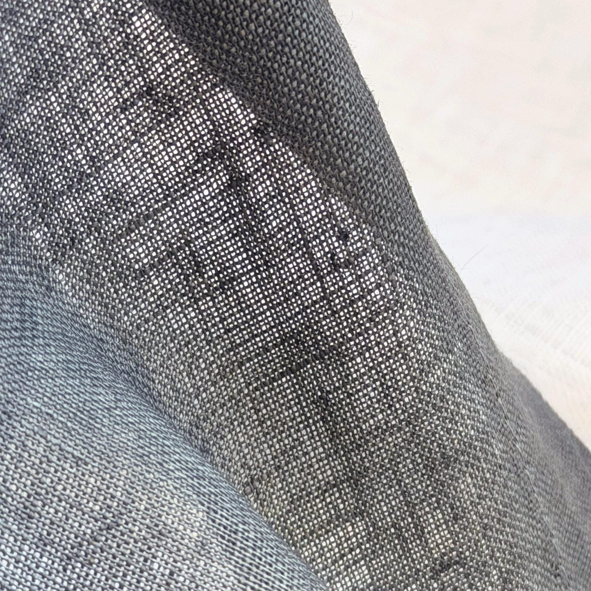 close-up of Soft Tone Noren — Ink Grey showing the natural resist-dye motif on linen