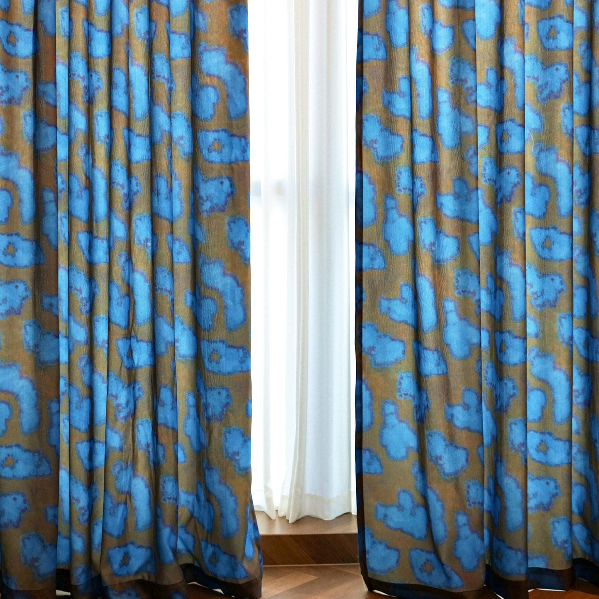 Pattern Drapery — Deep Blue shown in a bedroom interior with soft natural light