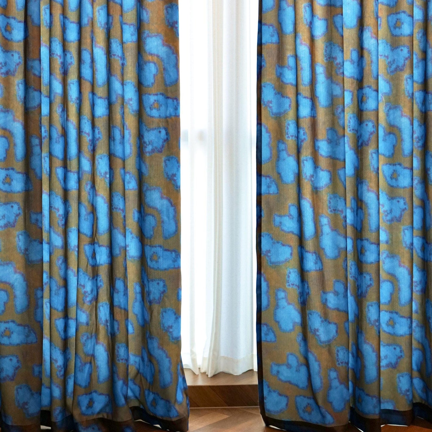 Pattern Drapery — Deep Blue shown in a bedroom interior with soft natural light