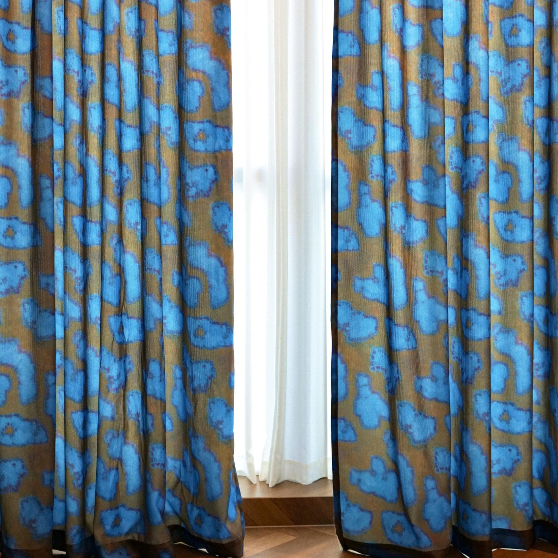 Pattern Drapery — Deep Blue shown in a bedroom interior with soft natural light