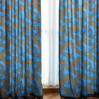 Pattern Drapery — Deep Blue shown in a bedroom interior with soft natural light