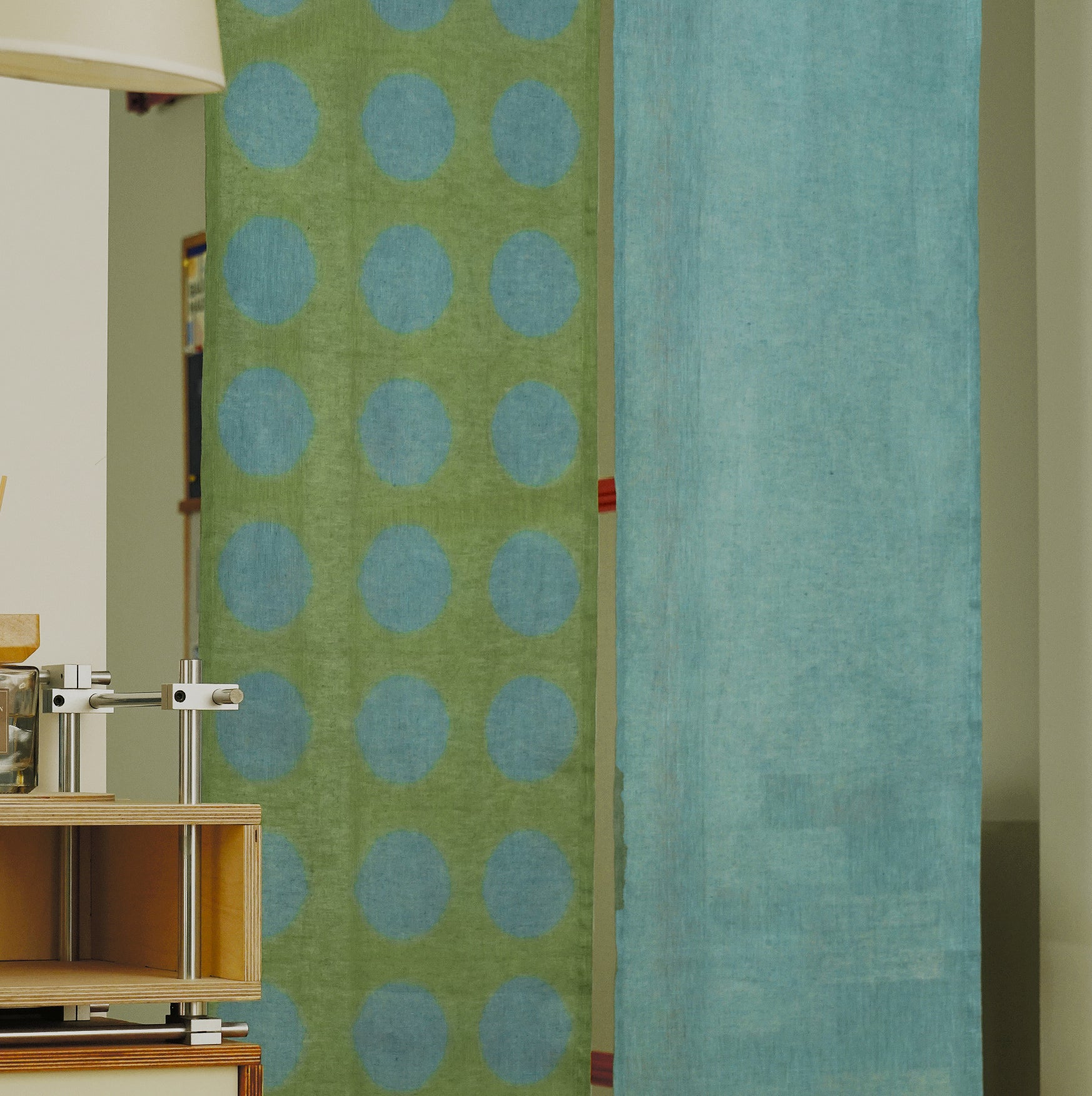 Hand dyed linen noren curtain in blue and green, close-up of the plant-dyed pattern