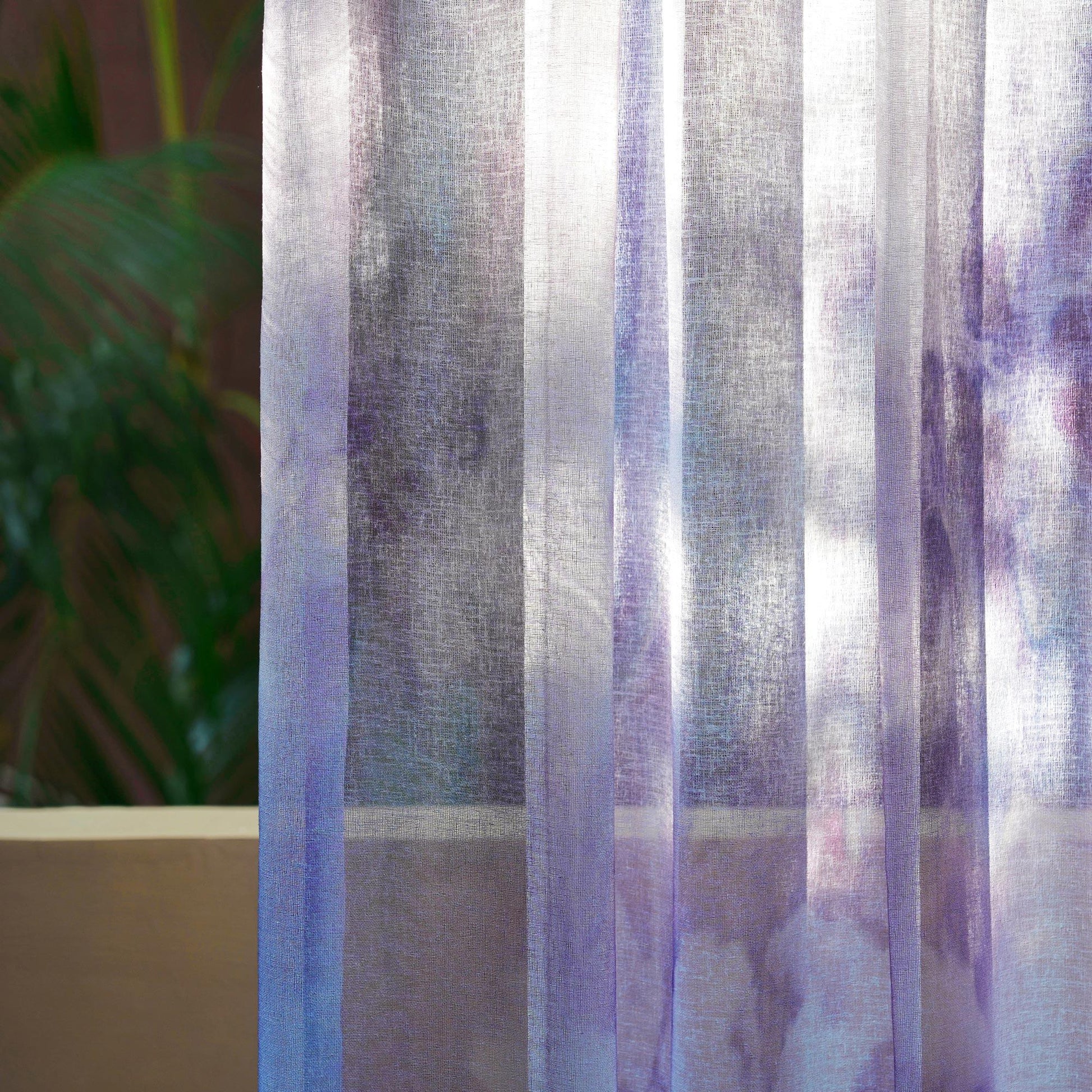 lifestyle scene with Pattern Drapery — Purple Haze creating a soft, airy room partition