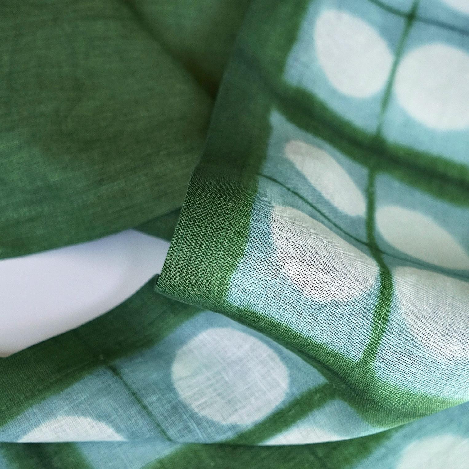 alternate angle of Motif Linen Noren — Soft Moss hanging as a two-panel doorway curtain
