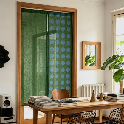 alternate angle of Polka Dot Linen Noren — Green / Dots hanging as a two-panel doorway curtain