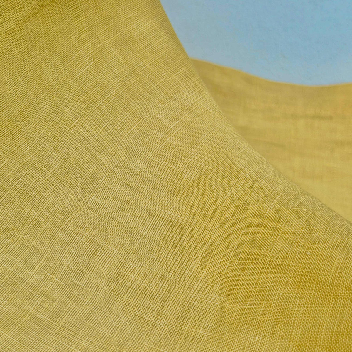 detail view of Linen Panel — Citron Yellow showing plant-dyed fabric texture and pattern