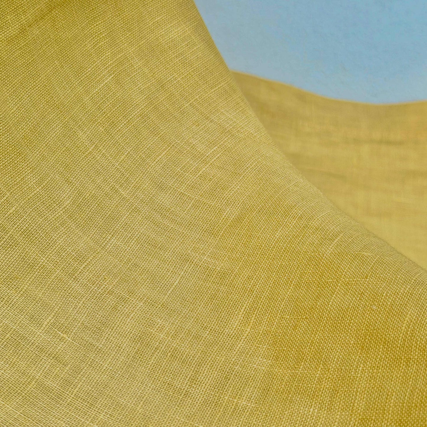 detail view of Linen Panel — Citron Yellow showing plant-dyed fabric texture and pattern