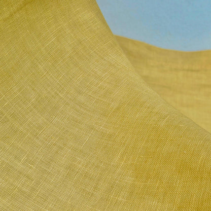detail view of Linen Panel — Citron Yellow showing plant-dyed fabric texture and pattern