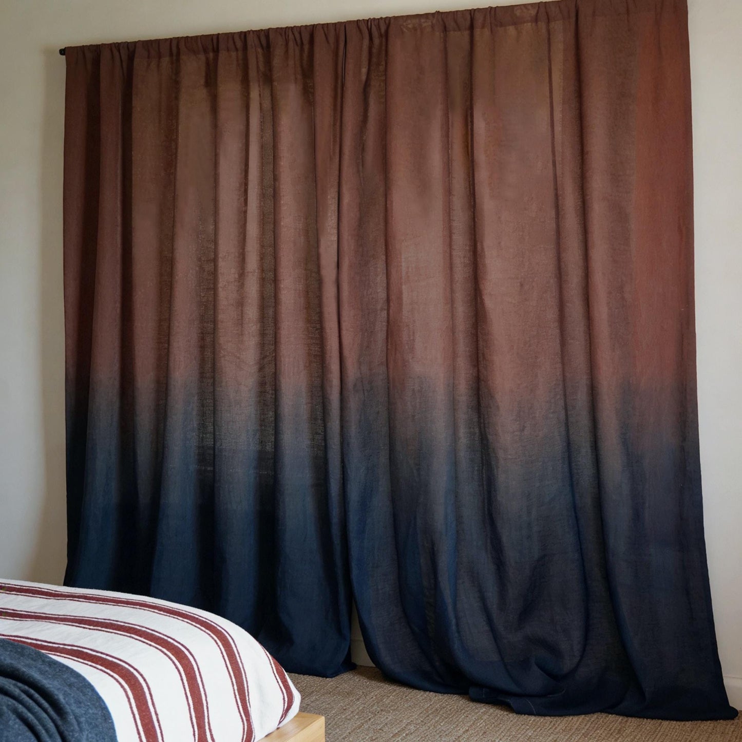 room scene with Linen Panel — Crimson Blue used as sheer curtains in a living space