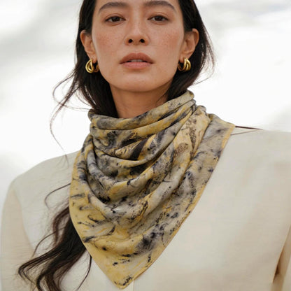 Scarf — Ochre Vine styled and worn, showing the natural plant-dyed pattern