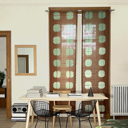 alternate angle of Motif Linen Noren — Amber Grid hanging as a two-panel doorway curtain