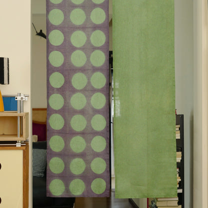 Hand dyed linen noren curtain in purple and green, close-up of the plant-dyed pattern