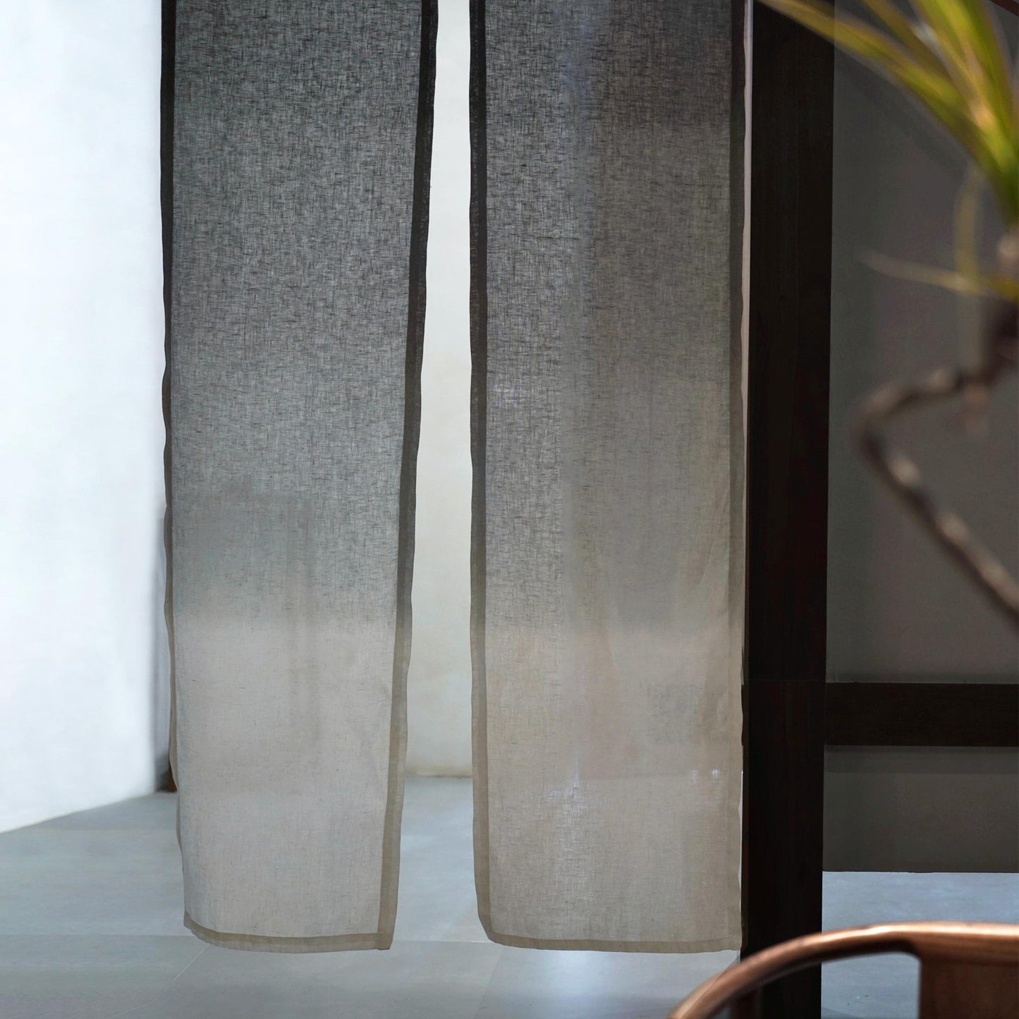 styled room scene with Soft Tone Noren — Ink Grey used as a window or doorway curtain