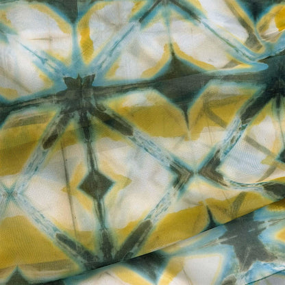Pattern Drapery — Moss Yellow shown in a bedroom interior with soft natural light