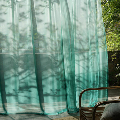 detail view of Sheer Curtain — Emerald Blue showing natural ramie texture and color
