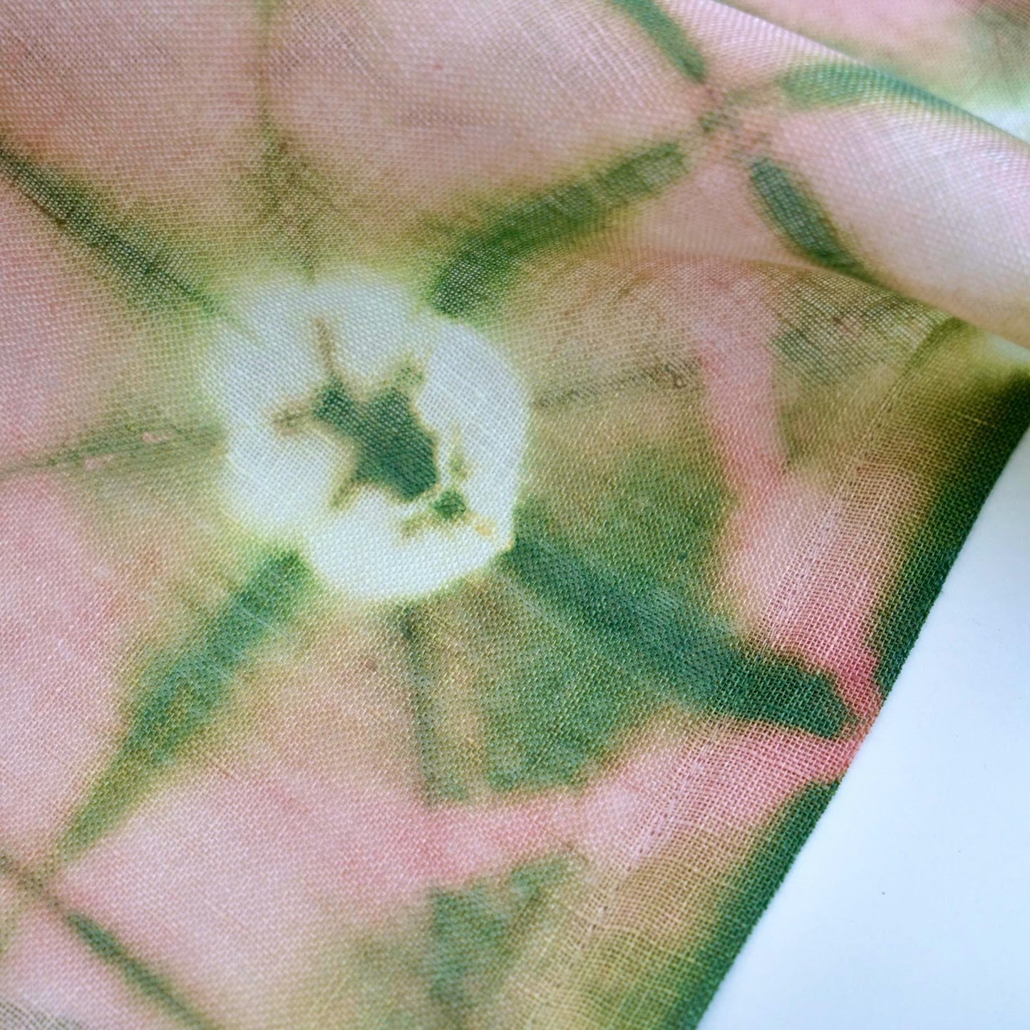 alternate angle of Motif Linen Noren — Peach hanging as a two-panel doorway curtain