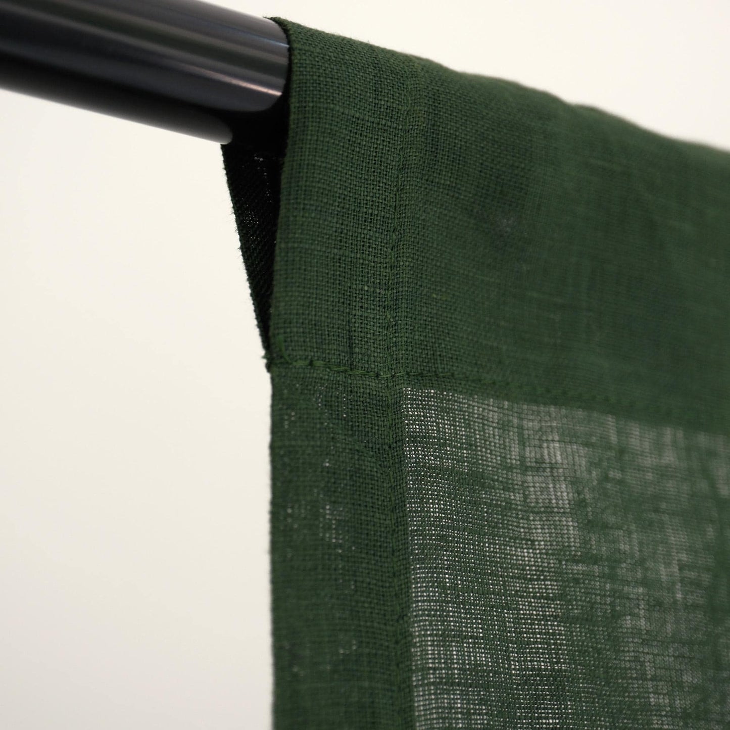 alternate angle of Soft Tone Noren — Sage Green hanging as a two-panel doorway curtain
