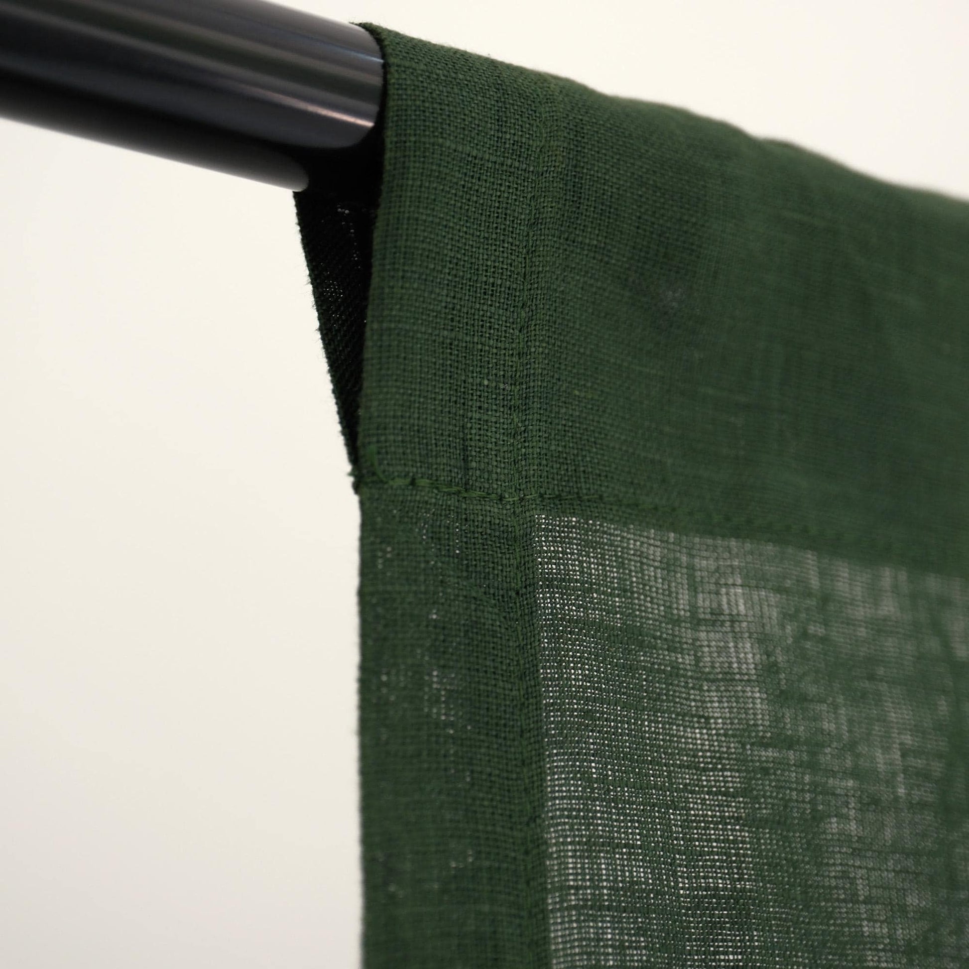alternate angle of Soft Tone Noren — Sage Green hanging as a two-panel doorway curtain