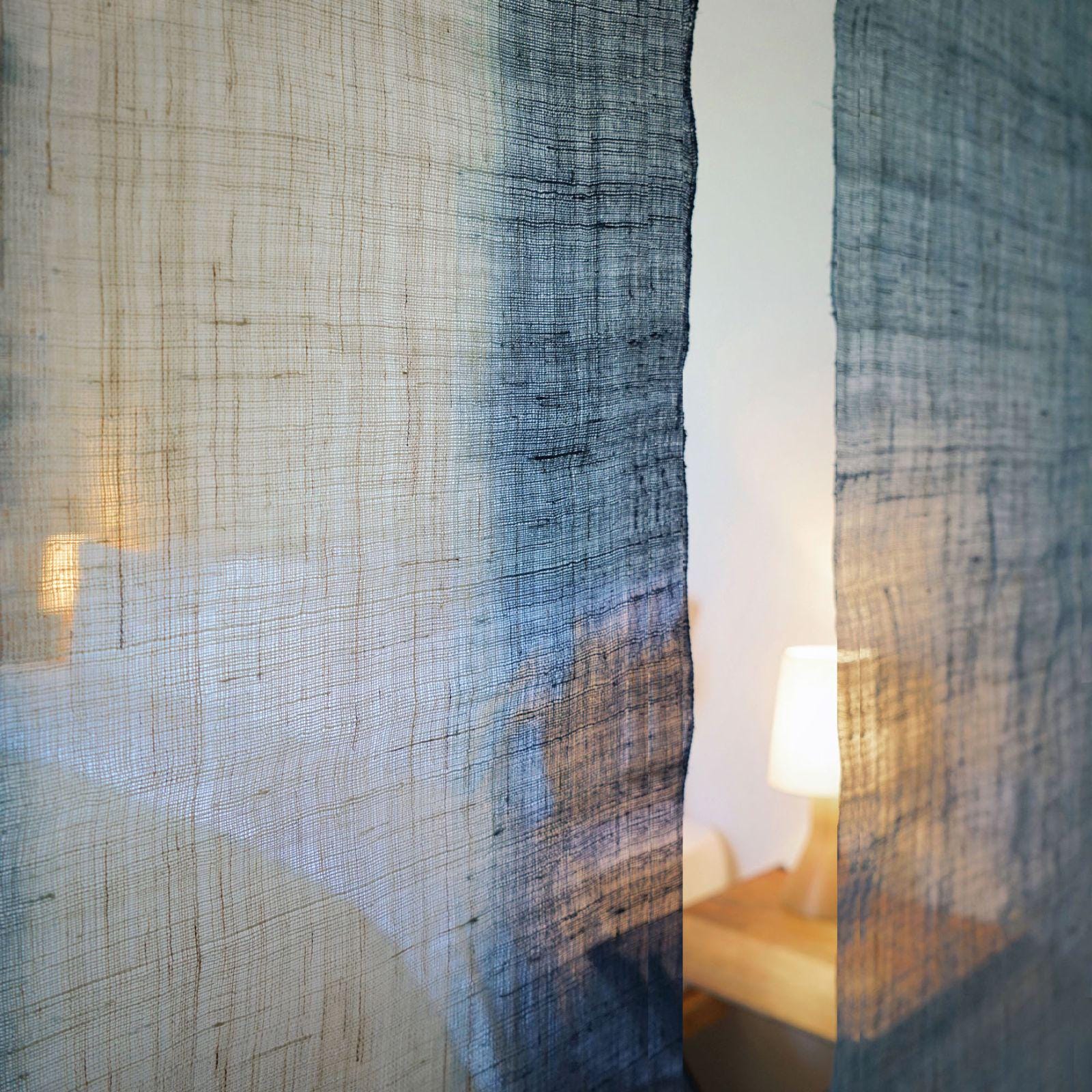 room scene featuring Ramie Ombre — Deep Blue hung by a window or doorway