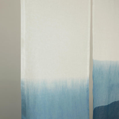 close-up of Soft Tone Noren — Mist Blue showing the natural resist-dye motif on linen