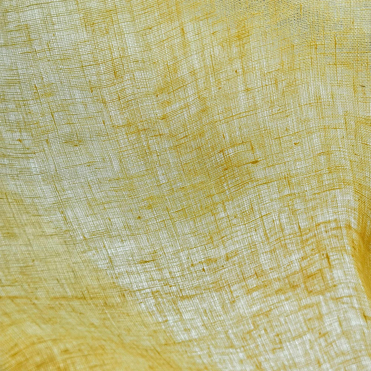 Linen Panel — Citron Yellow hanging by a window, filtering daylight in a styled interior