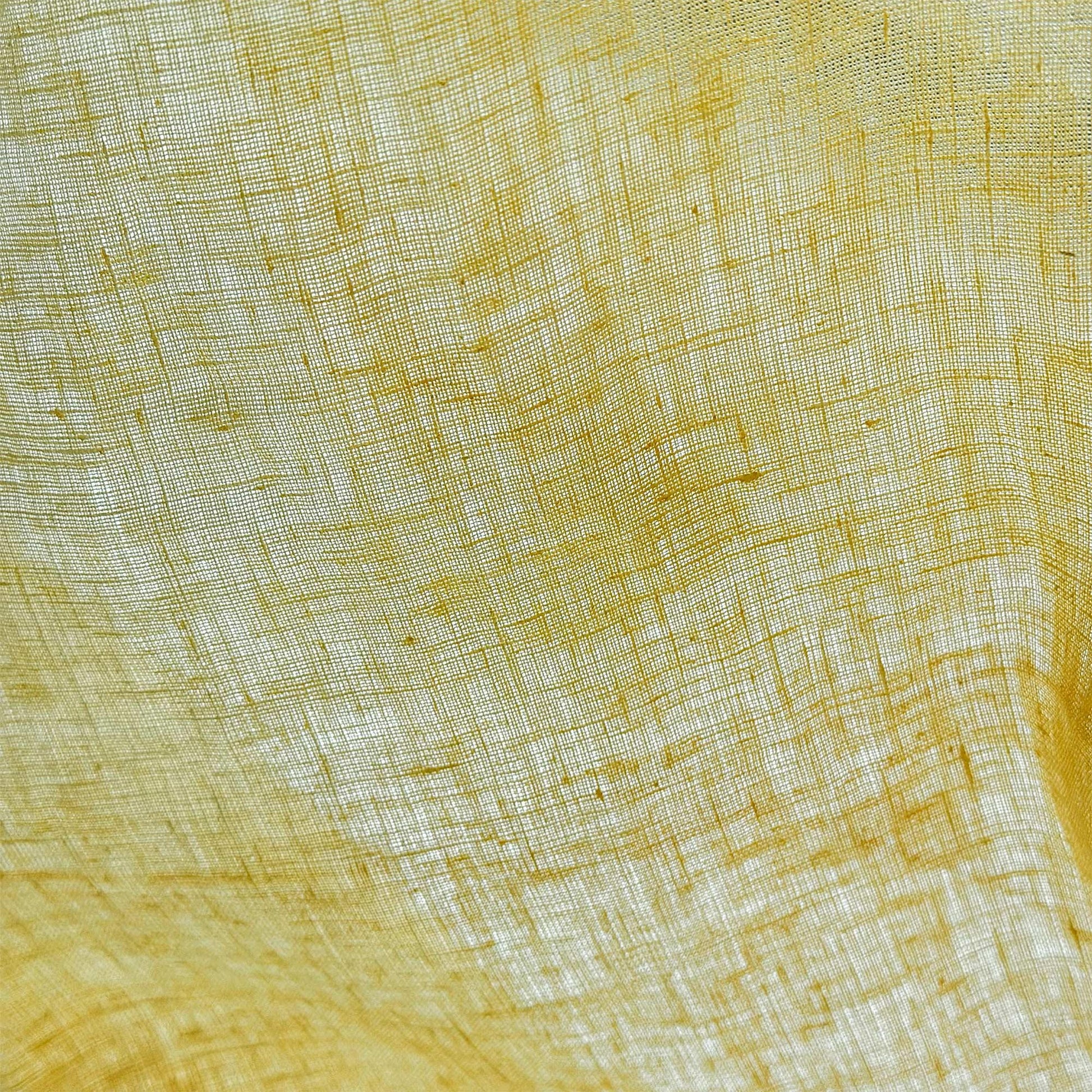 Linen Panel — Citron Yellow hanging by a window, filtering daylight in a styled interior