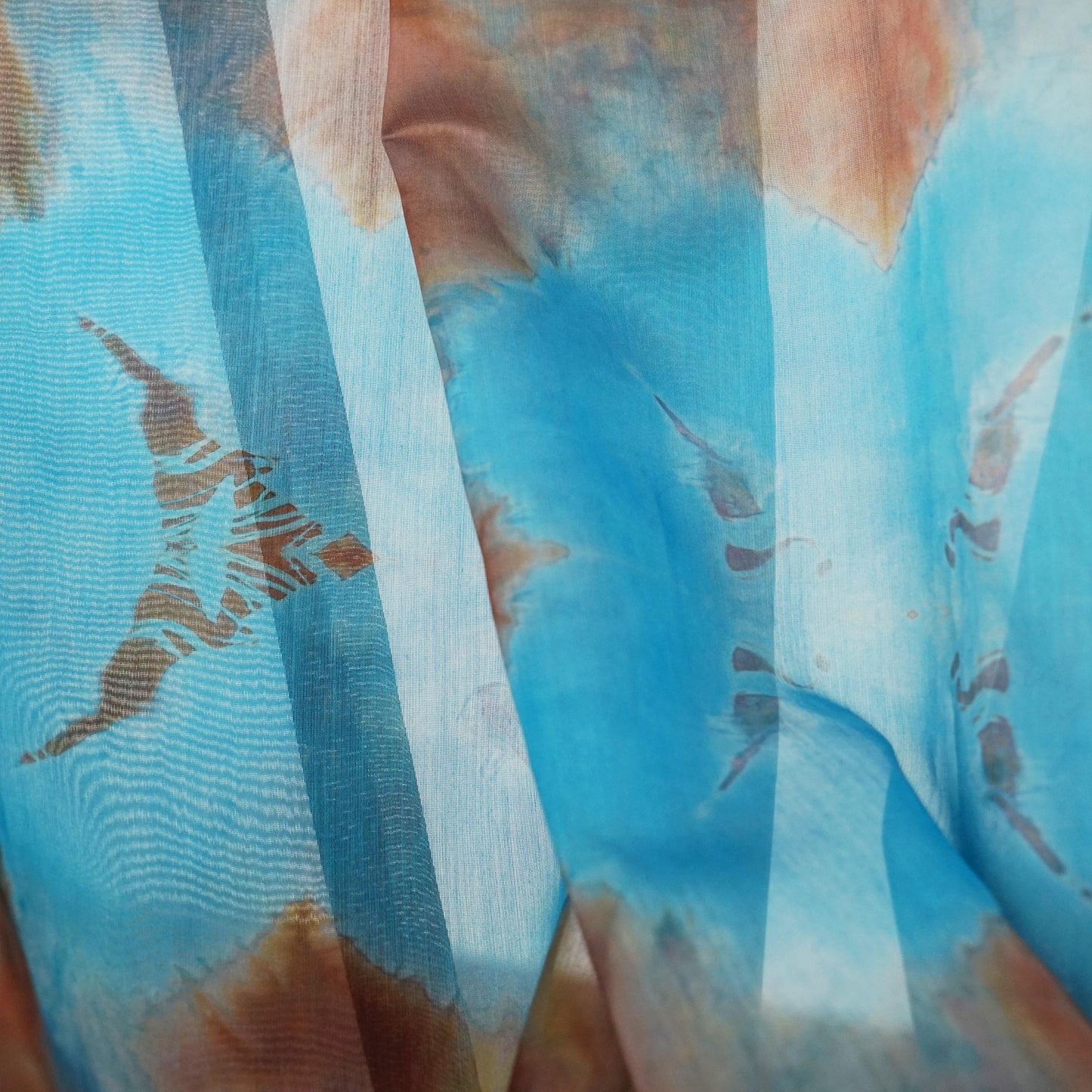 Pattern Drapery — Red Blue shown in a bedroom interior with soft natural light