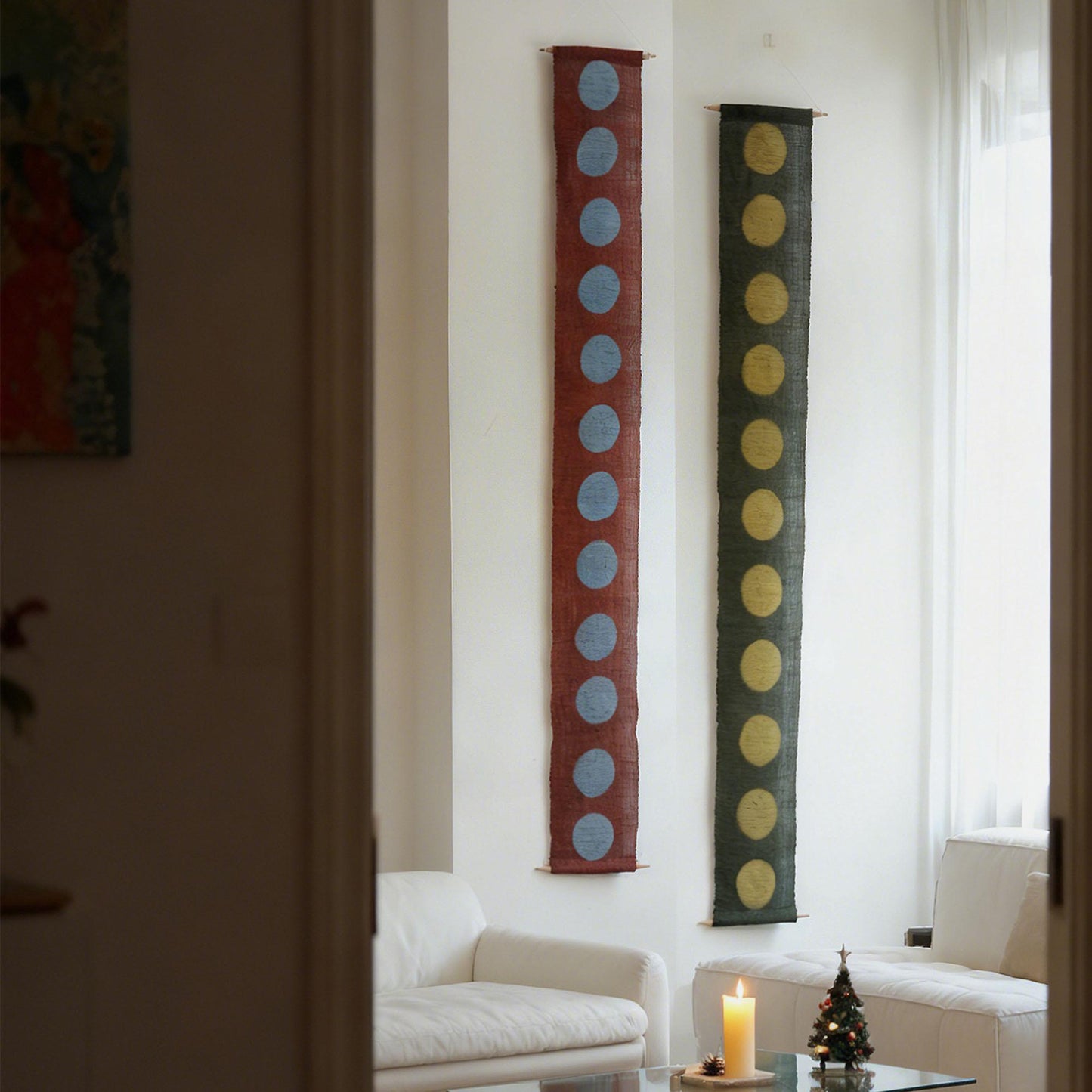 Narrow Ramie — Circles displayed vertically on a wall as a decorative textile banner