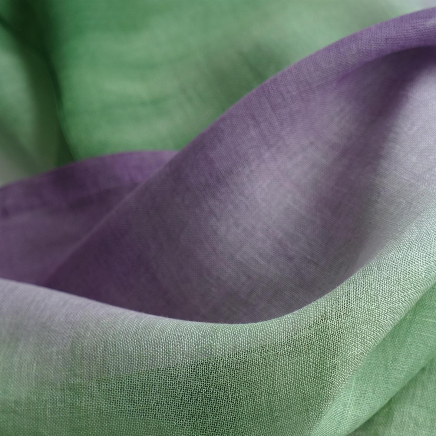 close-up of Motif Linen Noren — Green Flower showing the natural resist-dye motif on linen