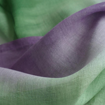 close-up of Motif Linen Noren — Green Flower showing the natural resist-dye motif on linen